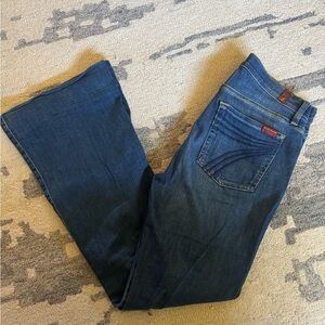 7 For All Mankind Medium-Dark Blue Boot Cut Jeans with Subtle Fading